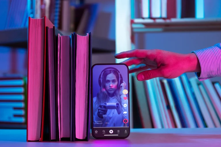 image of a woman holding a phone showing facebook reel and short form video ads